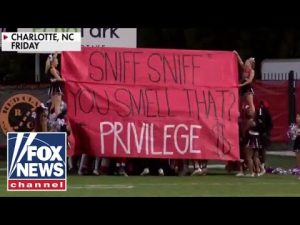 Read more about the article Parents outraged over ‘privileged’ sign at high school football game