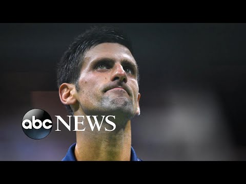 You are currently viewing Tennis star Novak Djokovic fights to stay at Australian Open