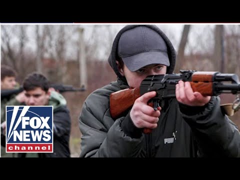 You are currently viewing Ukranian members of parliament take up arms, join citizens on the street to fight Russians