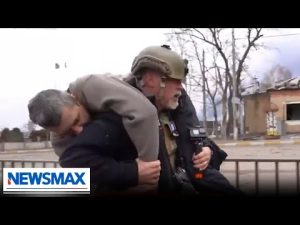 Read more about the article VIDEO: Newsmax journalist, veteran, stops to help injured Ukrainian refugee | John Bachman Now