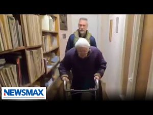 Read more about the article Newsmax reporter helps elderly woman in Ukraine | REPORT | ‘John Bachman Now’