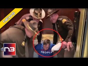 Read more about the article Patriot ARRESTED In State Senate Meeting for His Stickers!