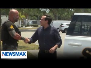 Read more about the article Newsmax correspondent rides along with police for National Police Week