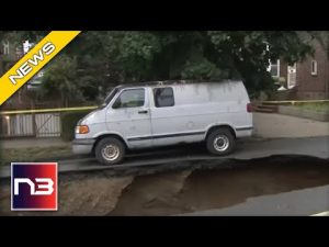 Read more about the article Van SWALLOWED Whole By Massive Sinkhole In Apocalyptic Clip