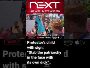 Read more about the article Protestor’s child holds sign: “Stab the patriarchy in the face with its own dick”