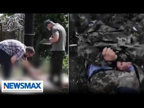 You are currently viewing WATCH: New footage reveals Russians torturing Ukrainian POWs