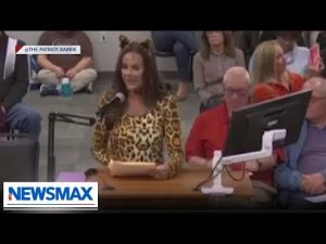 Read more about the article WATCH: Mom protests wokeness in cat costume at school board meeting