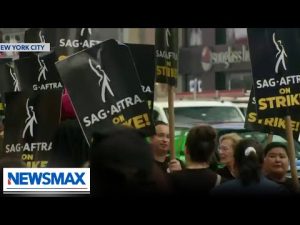 Read more about the article WATCH: Workers strike in NYC for Hollywood actors and writers