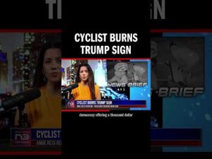 Read more about the article Cyclist Burns Trump Sign