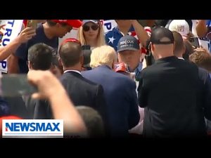 Read more about the article WATCH: Trump signs fans hat after medical incident